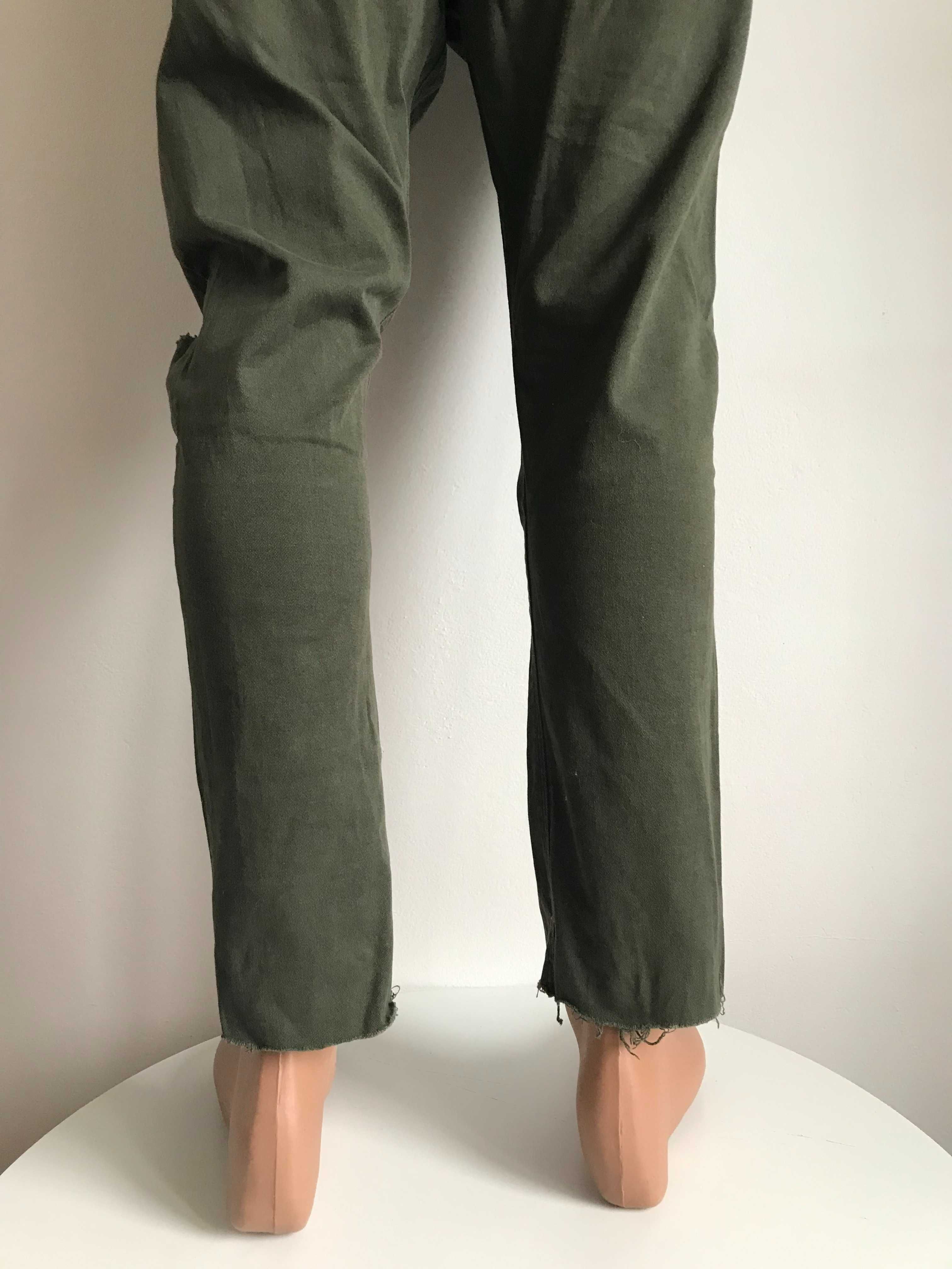 Nowe rurki spodnie dziury material meskie zielone khaki L