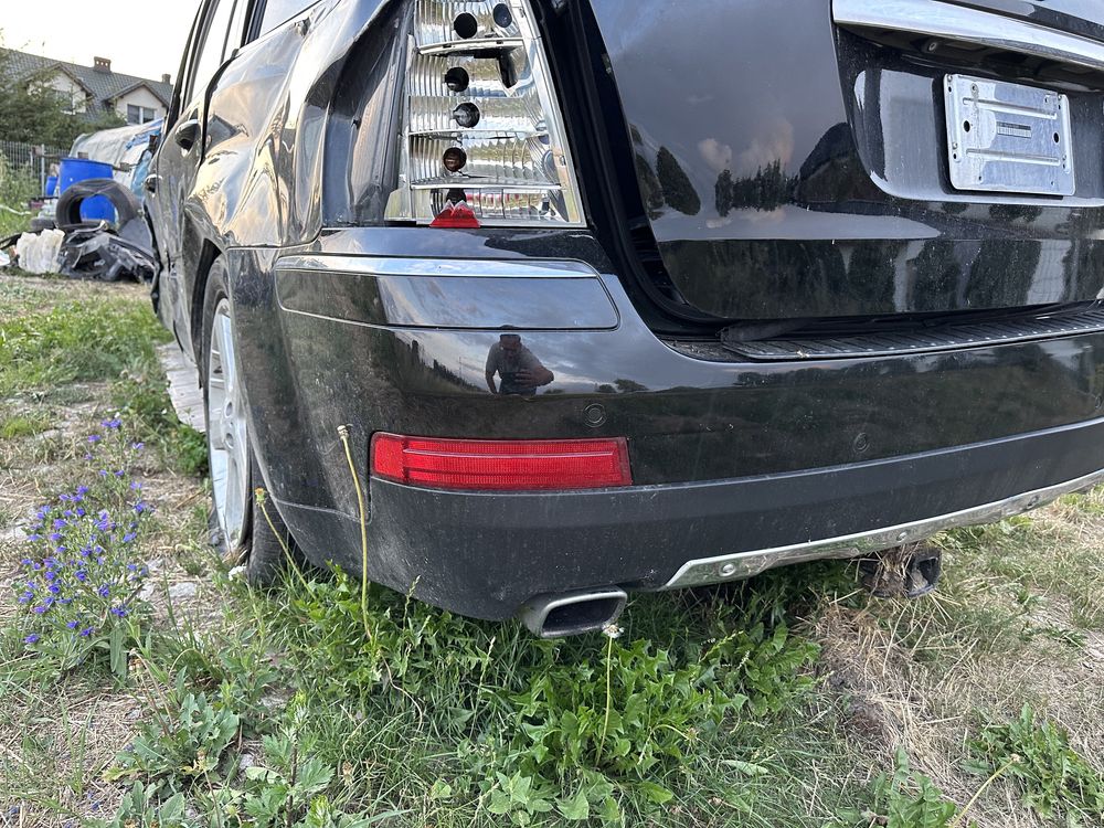 Mercedes GL w 164 zderzak tylni kpl lekko uszkodzony