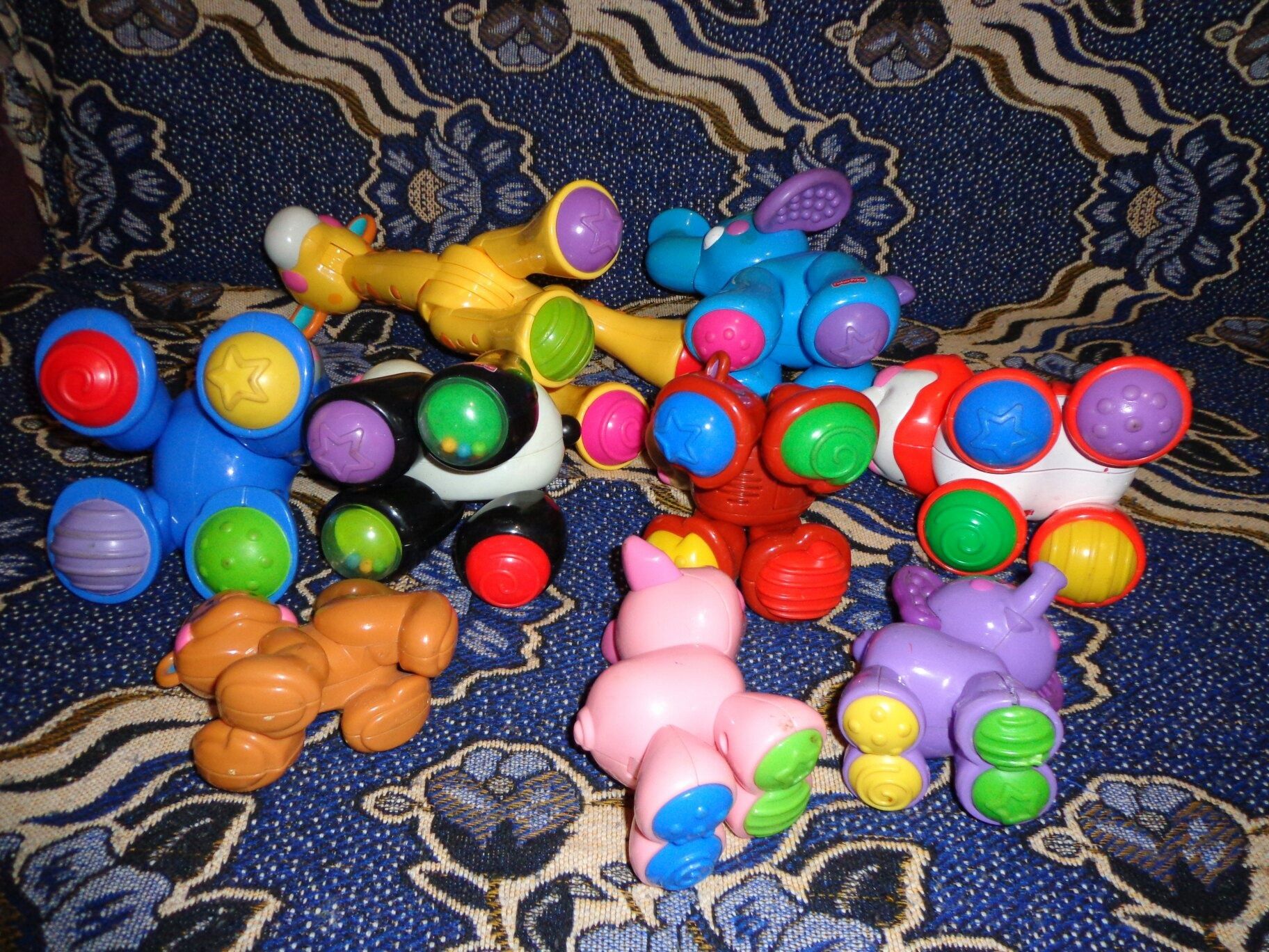 Животные игрушки трещетки сумочка Фишер Прайс Fisher Price