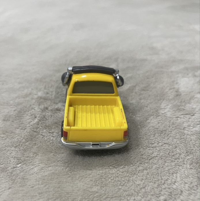 Колекційна машинка з мультфільму  «Тачки»  Джон Лассетер.