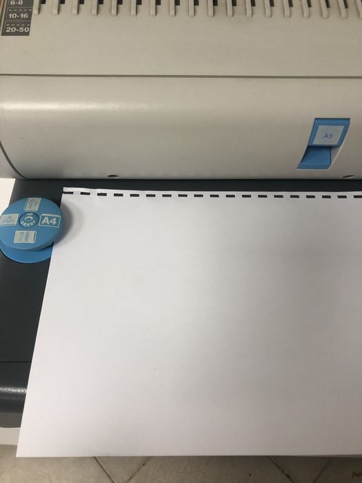 Perfuradora e encadernadora