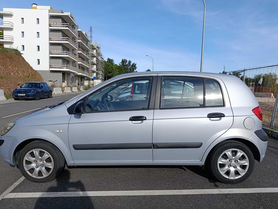 Getz 2007, AC, direção, travas e vidros elétricos