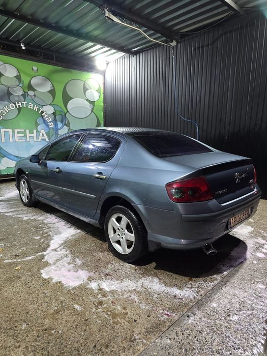 Пыжо 407 2004г .