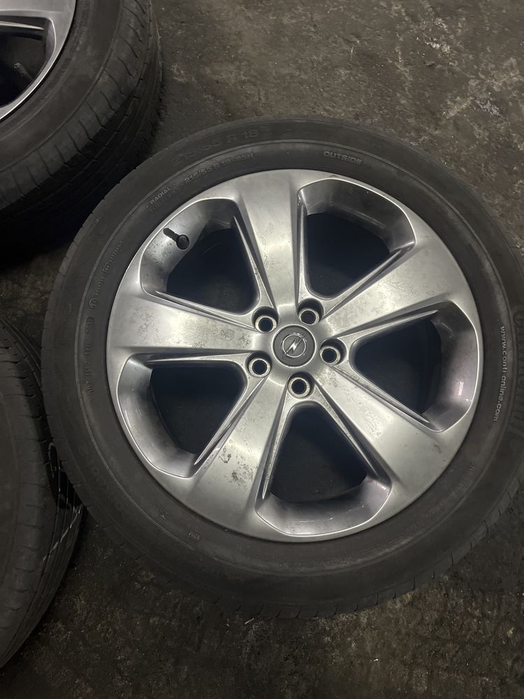 Диски с резиной GM 5/108 18x7.0j x38 Continental 215/55R18 36.12 года