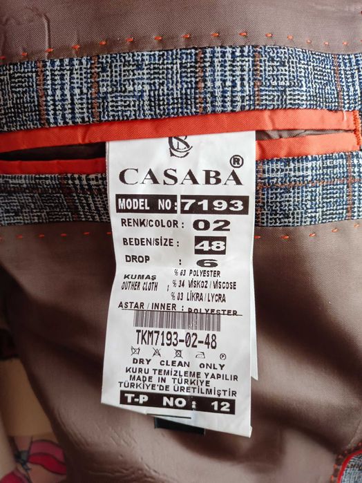 Чоловічий костюм трійка