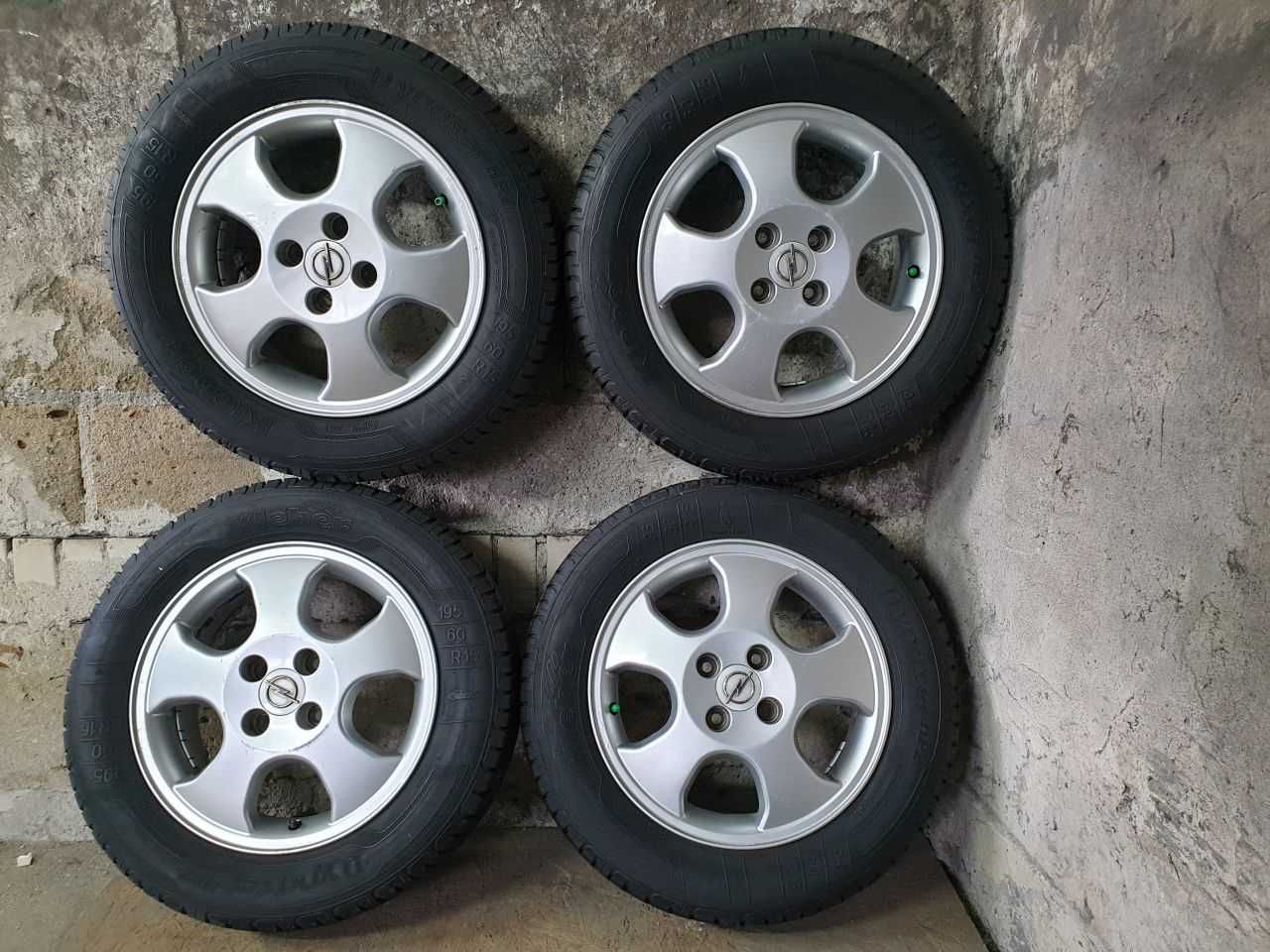 Felgi aluminiowe Opel R15 4x100 6JX15H2 ET 49 centr 56,6mm