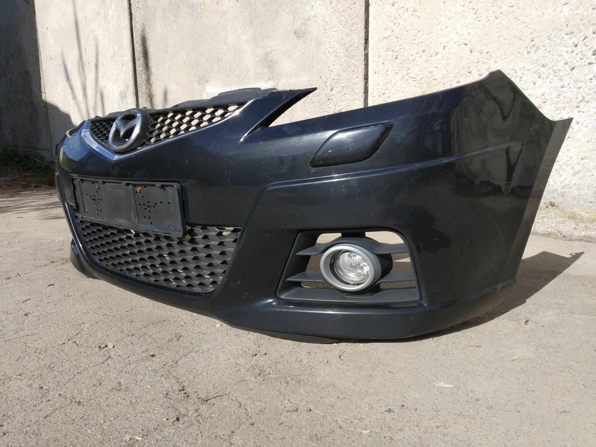 Бампер передній Mazda 5 2005-2009