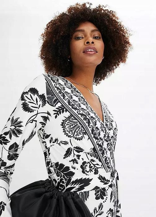 B.P.C kombinezon biały z czarnym nadrukiem ^40/42