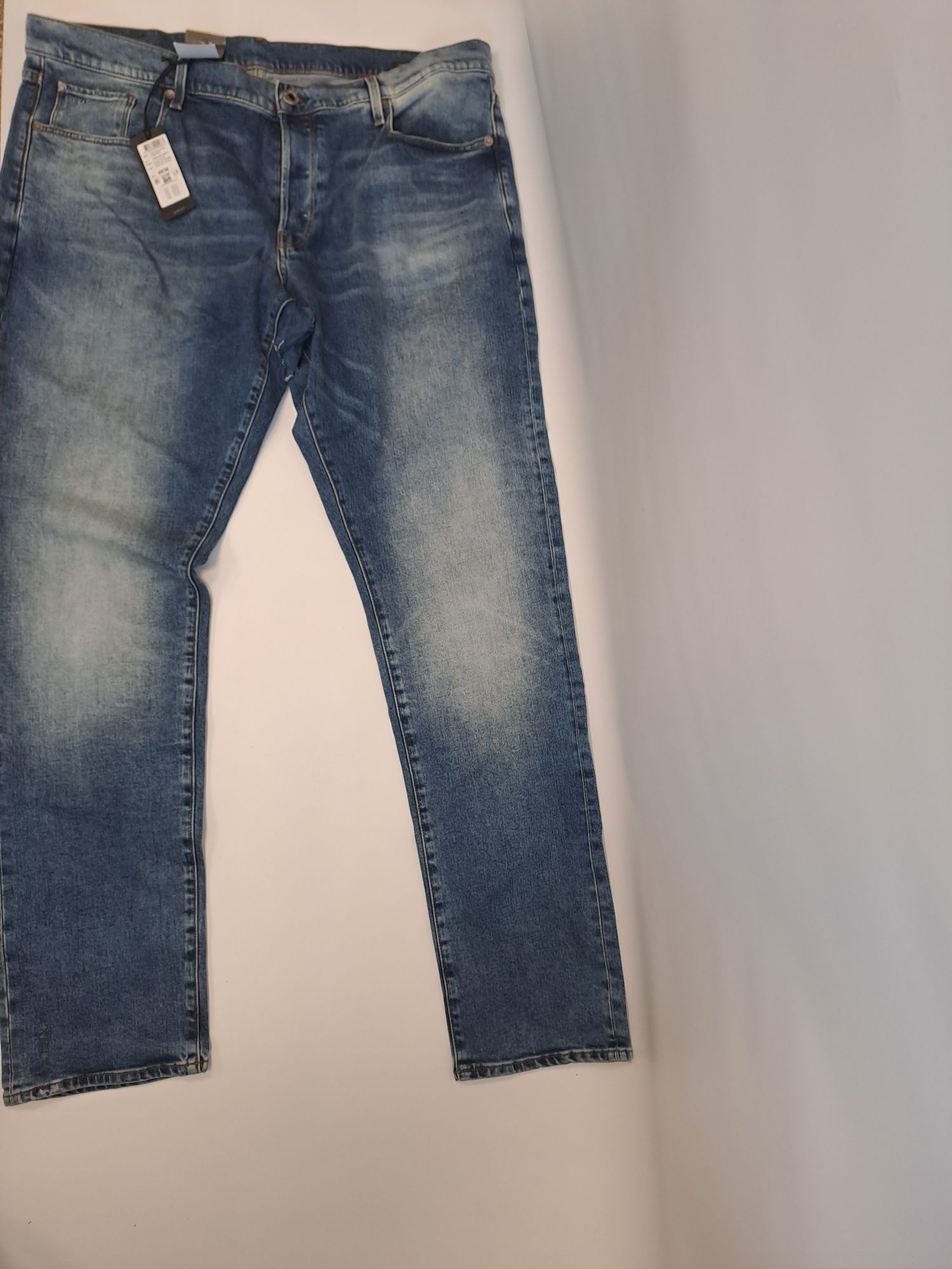 Nowe z metką jeansy G-STAR RAW 3301 uszkodzone
