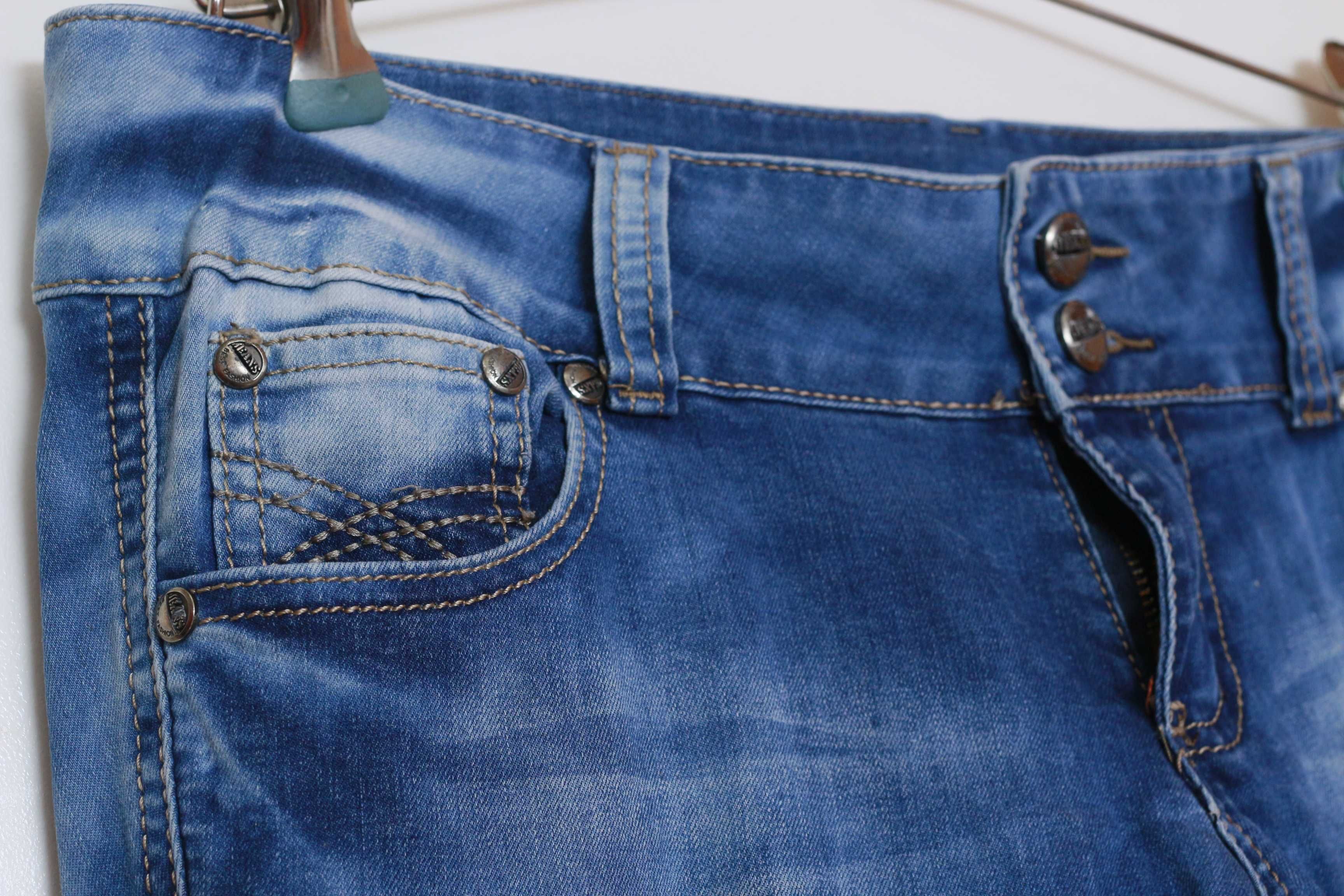 Jeansy spodnie indygo Pebo Jeans z rozdarciami