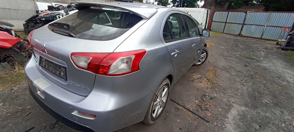 ćwiartka tył tylna mitsubishi lancer 1.8 4b10 140 km  lak A31