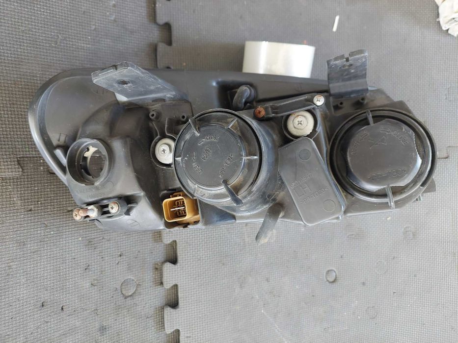 farol esq Chevrolet captiva