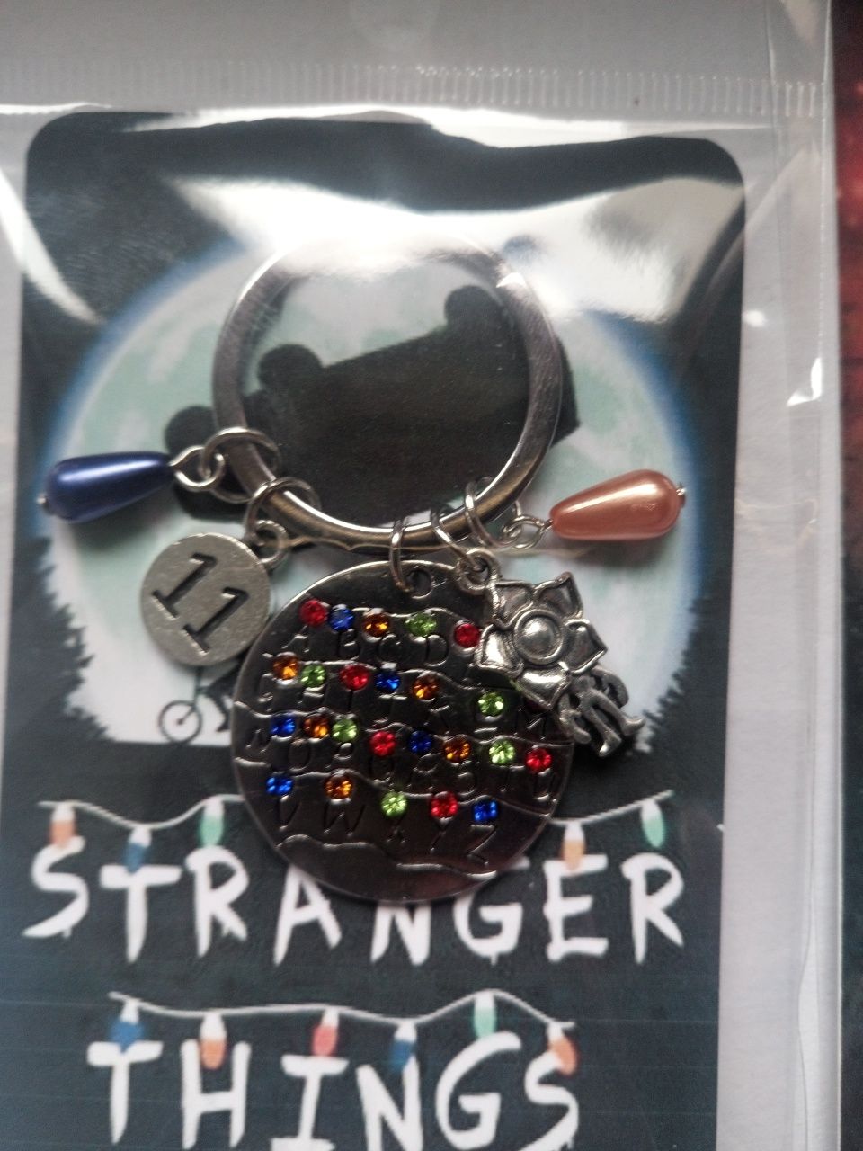 Porta Chaves + PIN OFERTA Stranger Things Eleven Remendo Emblema Patch