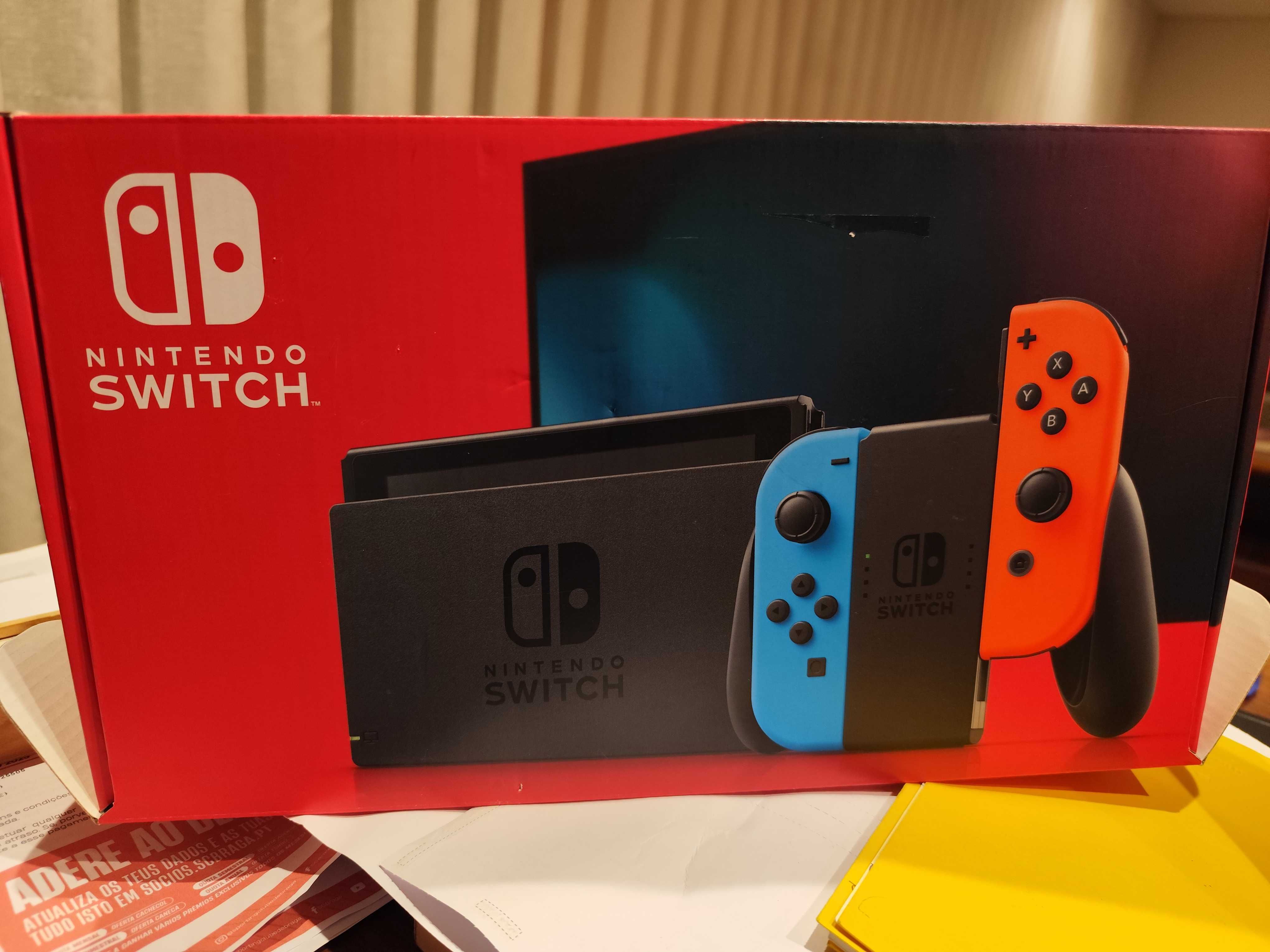 Nintendo Switch + 4 jogos + 1 Comando extra