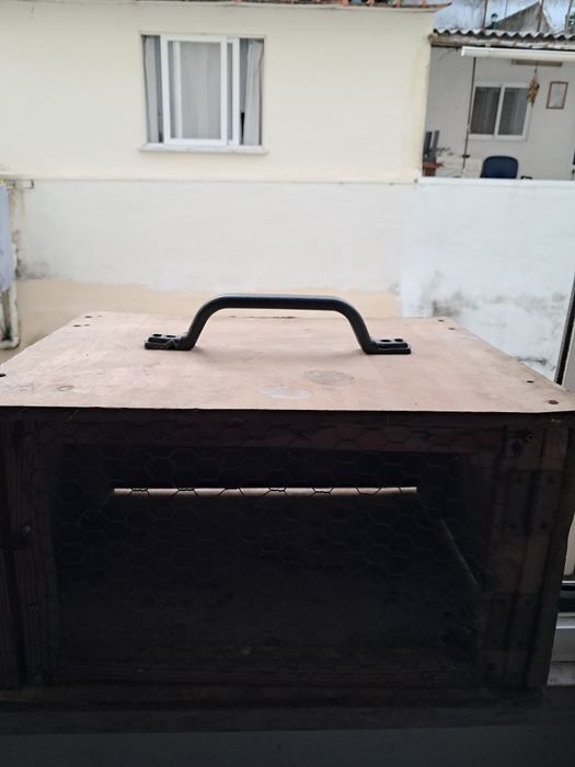 Caixa de transporte de pombos