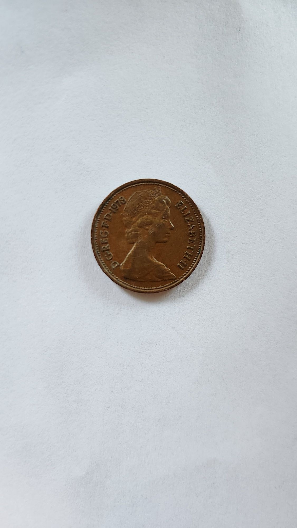 Монета New pence