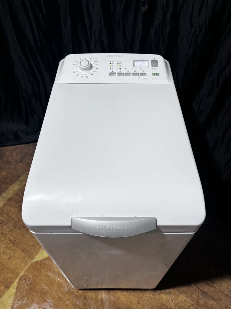 Вертикальная стиральная машина ELECTROLUX ewt10410. Доставка