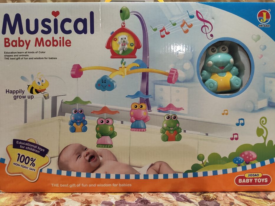 Мобиль механический новый