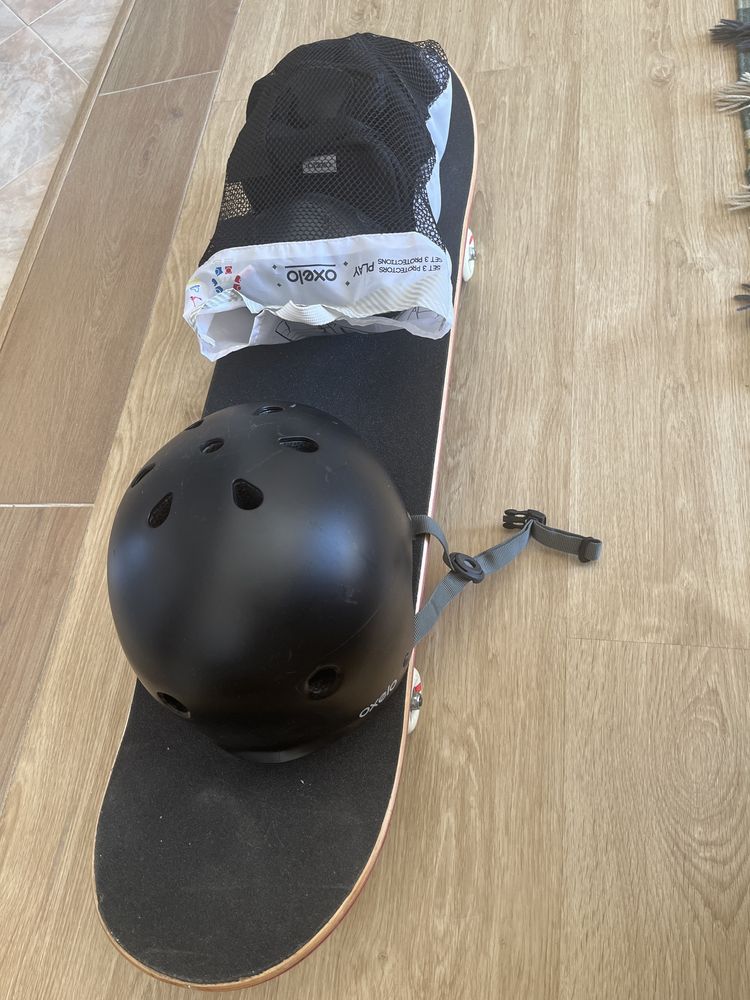 Skate board com capatecete e proteções