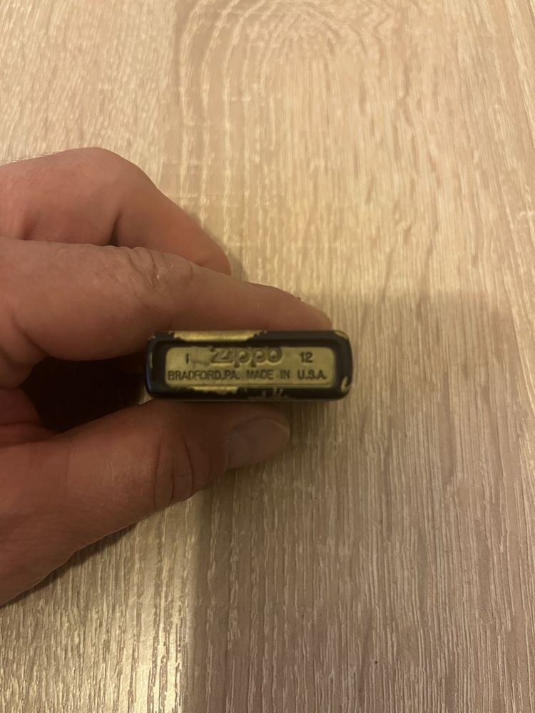 Продам зажигалку Zippo