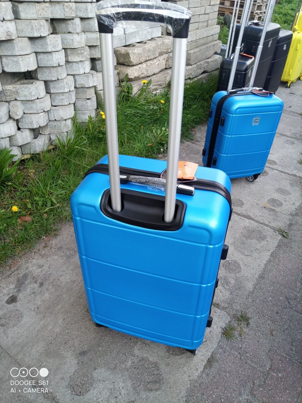 Nowa średnia walizka podróżna ABS na 4 kółkach obracanych 360 stopni