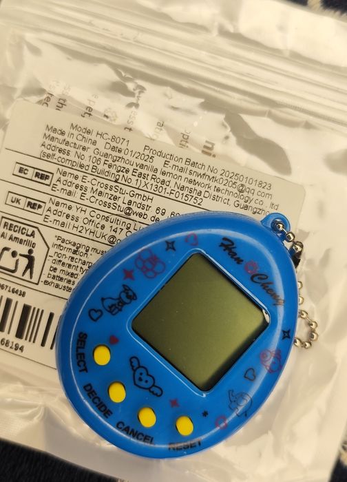 Tomagotchi zwierzątko interaktywne gra retro niebieska