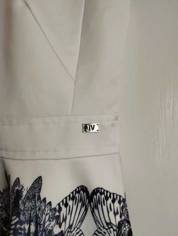 Biała bluzka top bez rękawów z baskinką damska Josh V elegancka