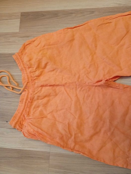 Lniane spodnie pomarańczowe