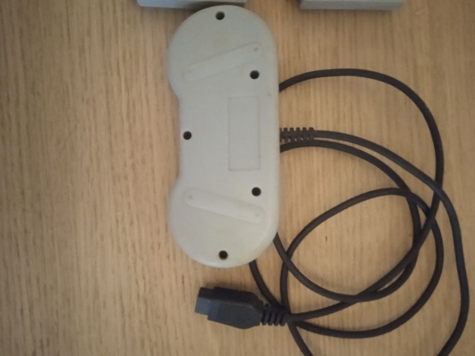 2 jogos Nintendo antigos e comando