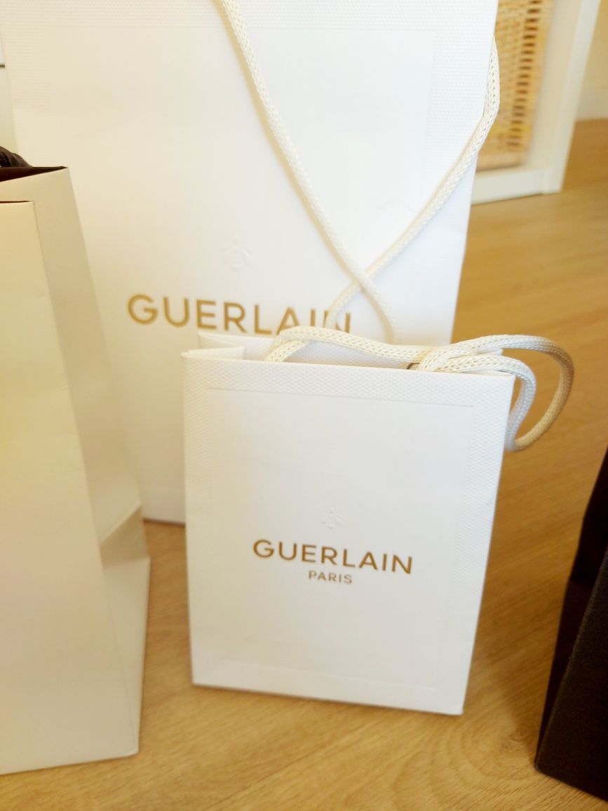 Sacos da marca Guerlain