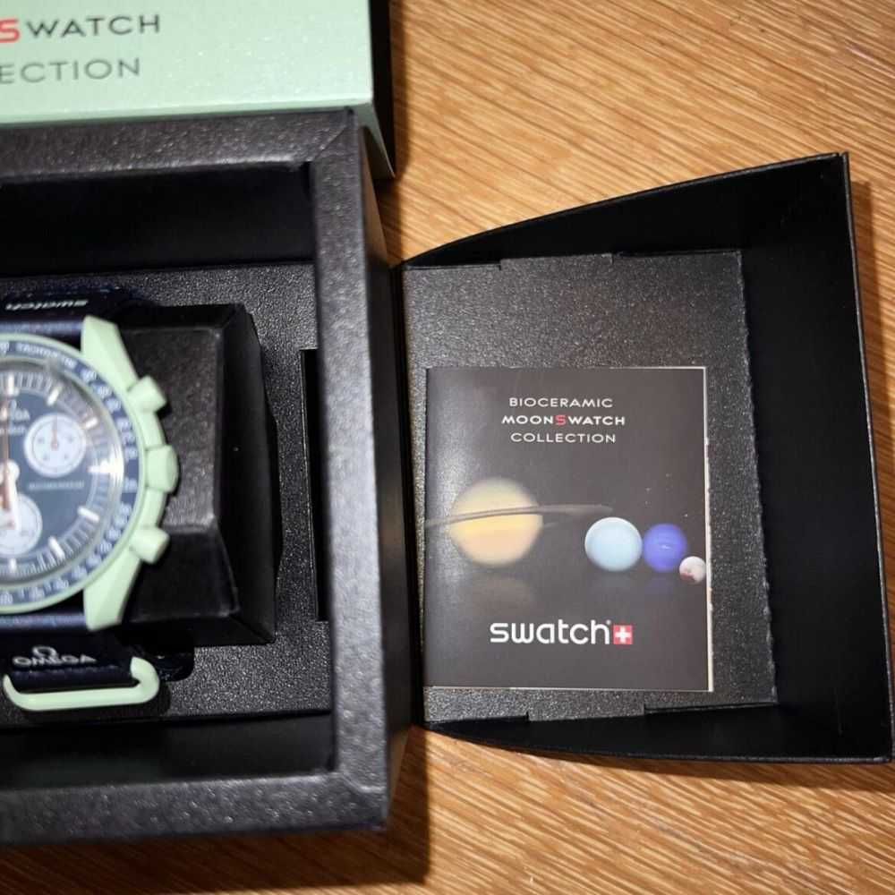 SO33G100 Earth - Omega x Swatch W Hołdzie Planecie