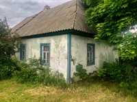 Продам дом с большим участком в центре села Воропаев. Центр.