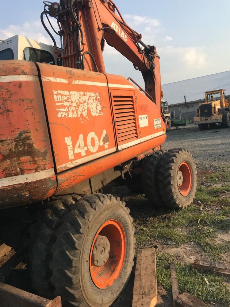 Ескаватор Atlas 1404