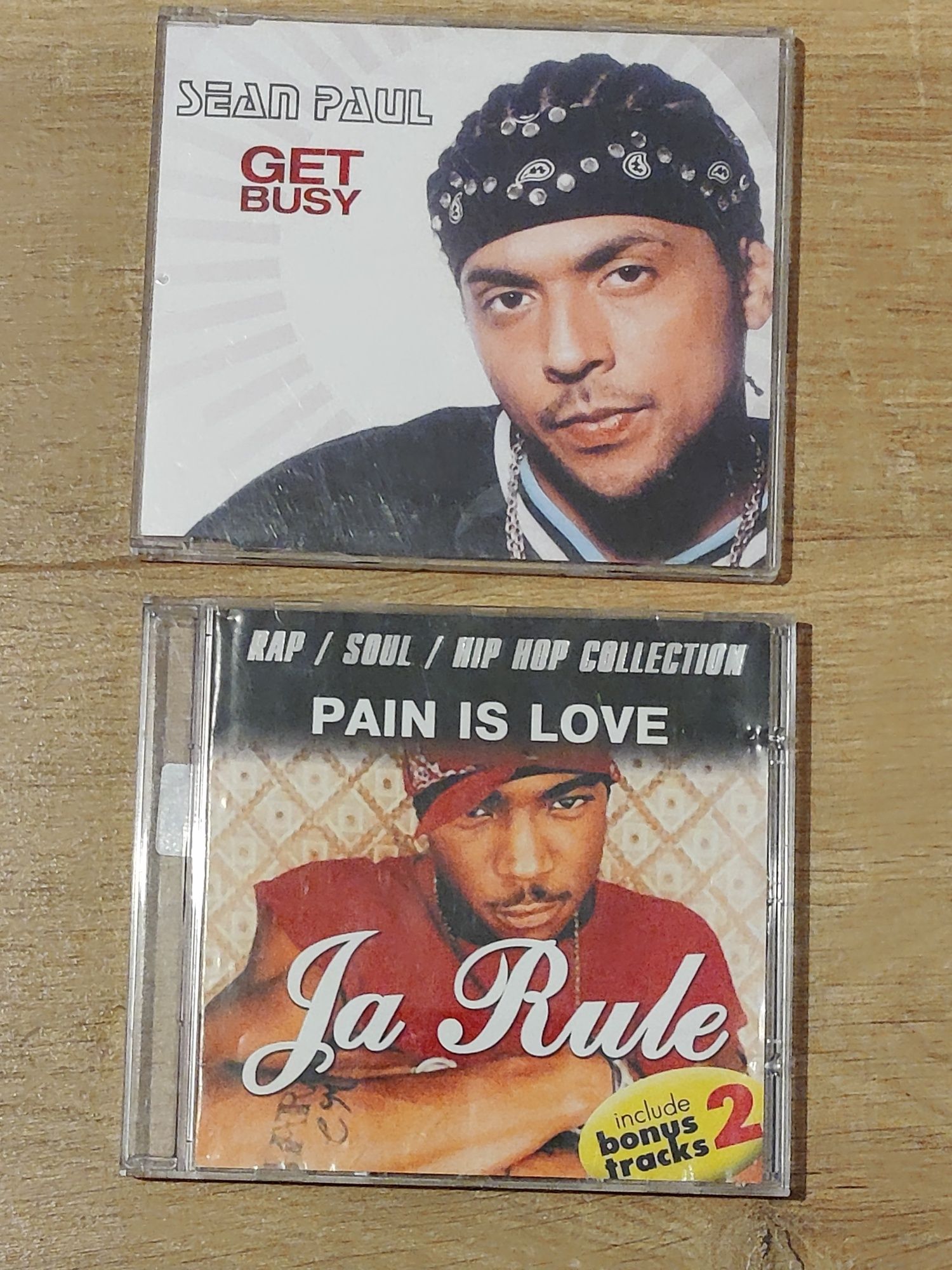 Sean Paul - Get Busy;  Ja Rule -  Pain is Love CD