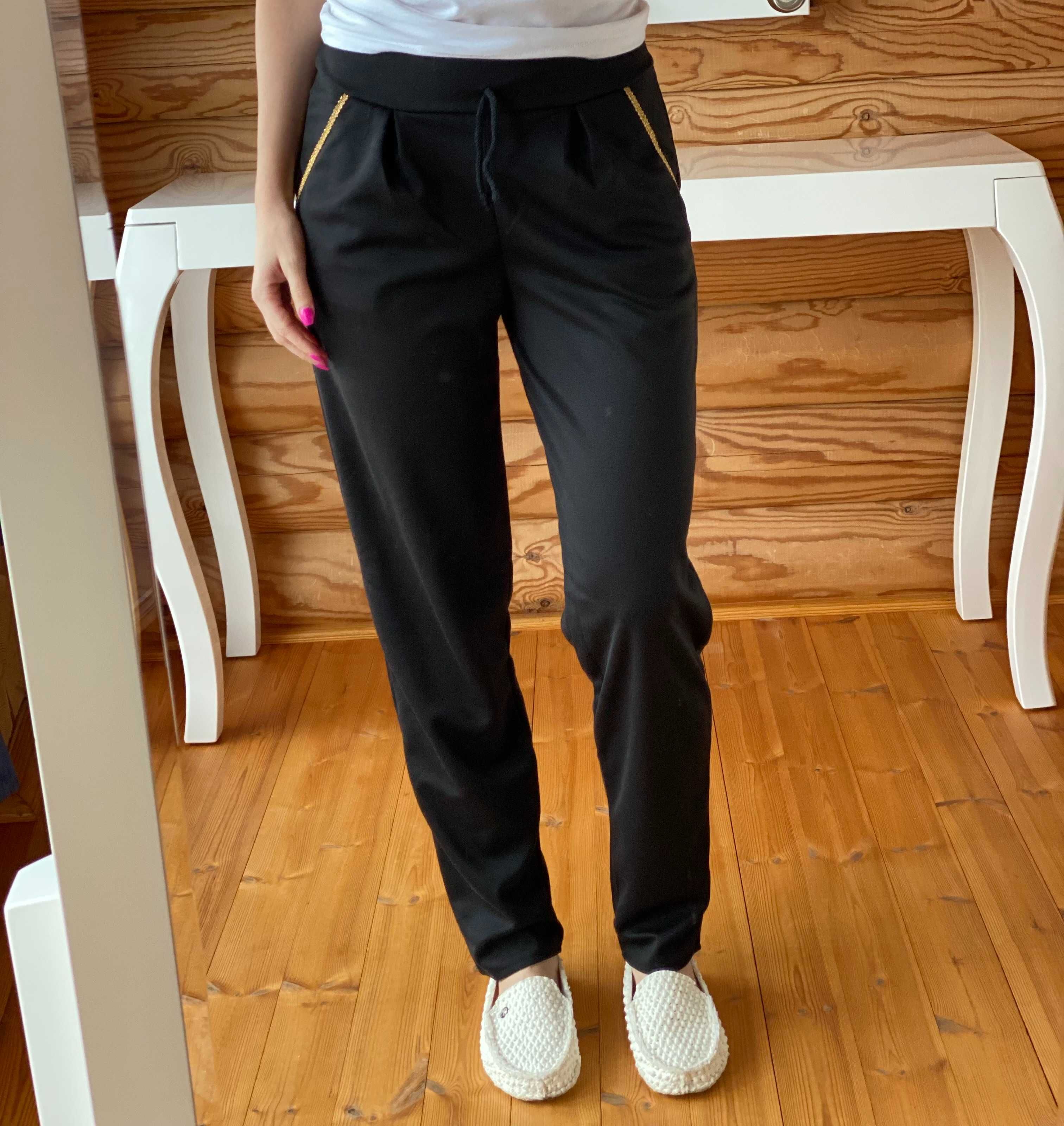 Wygodne spodnie damskie z kieszeniami czarne - S (metka M)