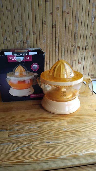 Соковижималка для цитрусових електрична