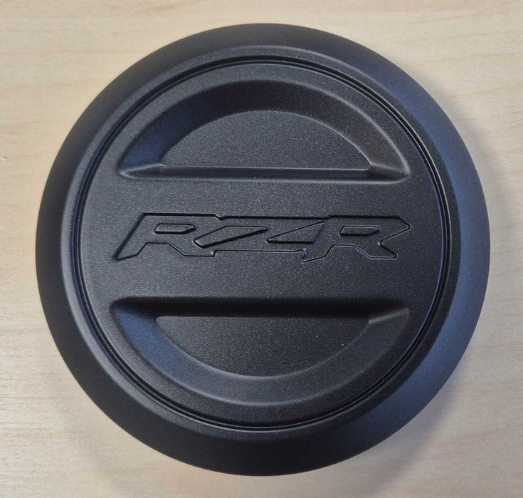 Dekielek, kołpak felgi quad POLARIS