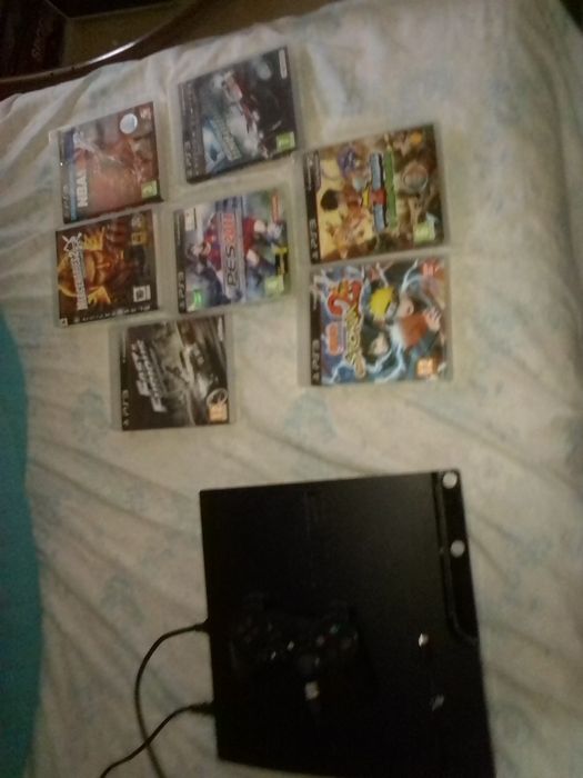 Ps3 com 500g 1 comando sem fios e 7 jogos impecável