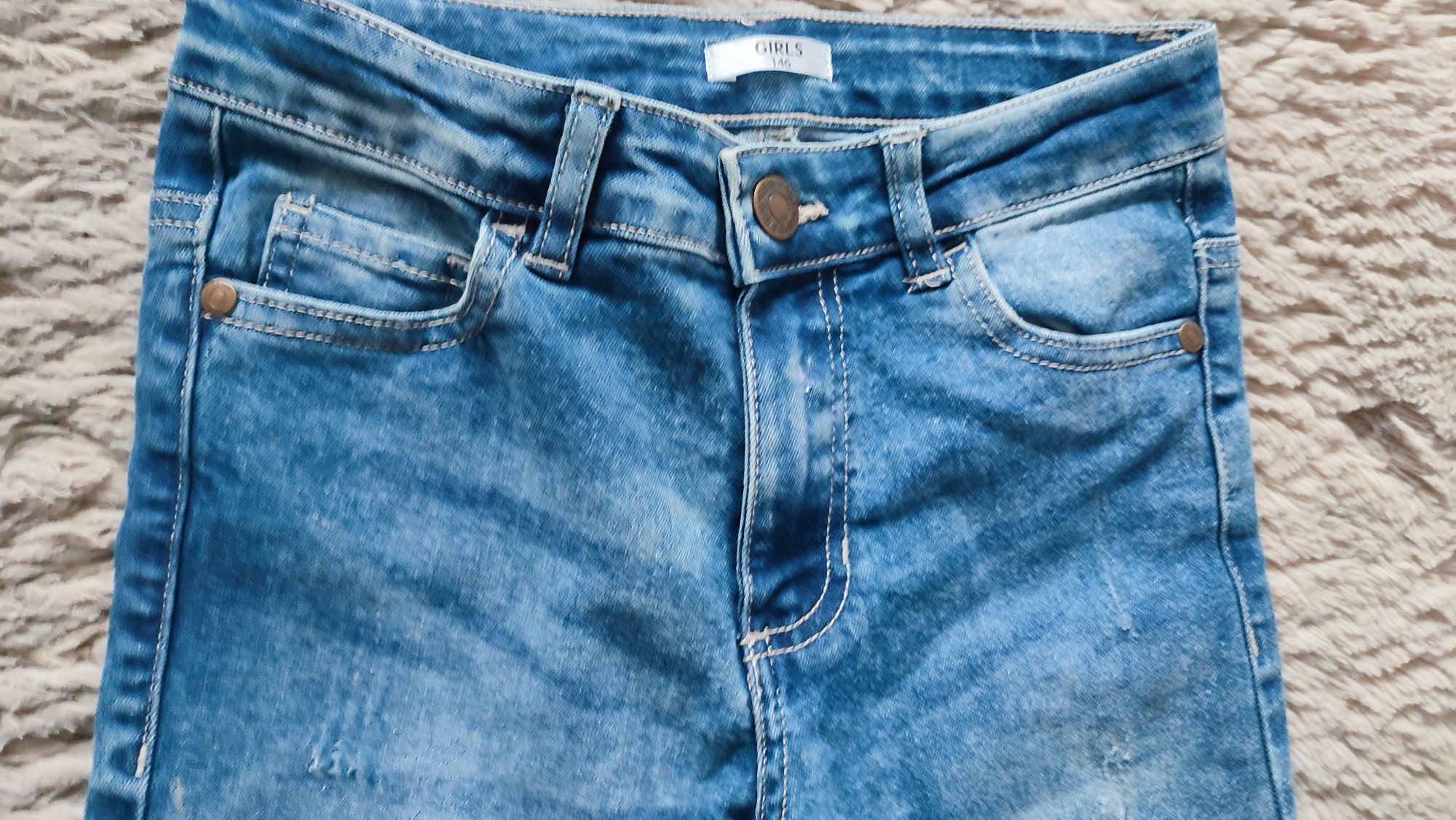 Spodnie H&M dżinsowe dla dziewczynki niebieskie,ciemny roz.146 szary