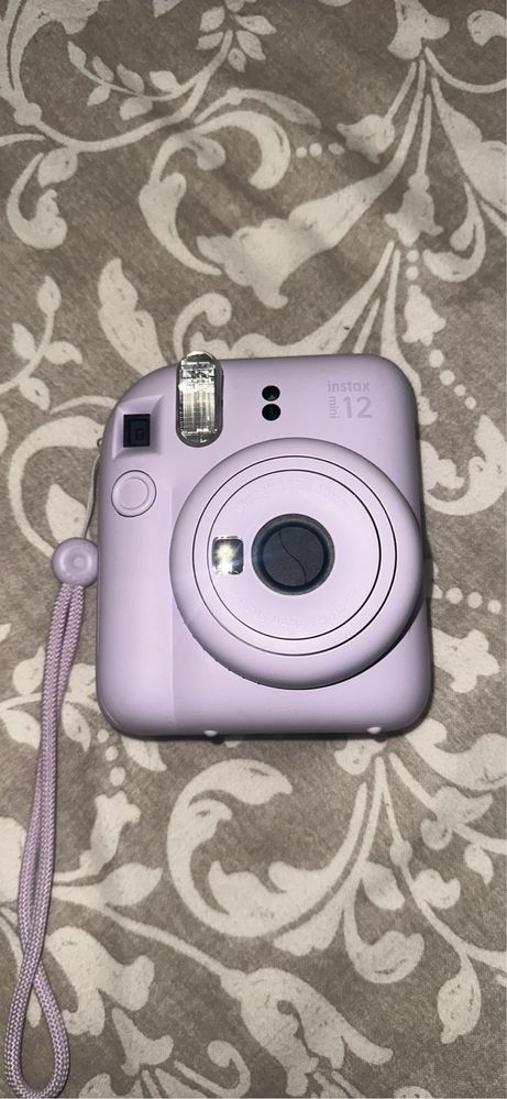 Câmera Instax mini 12 + capa