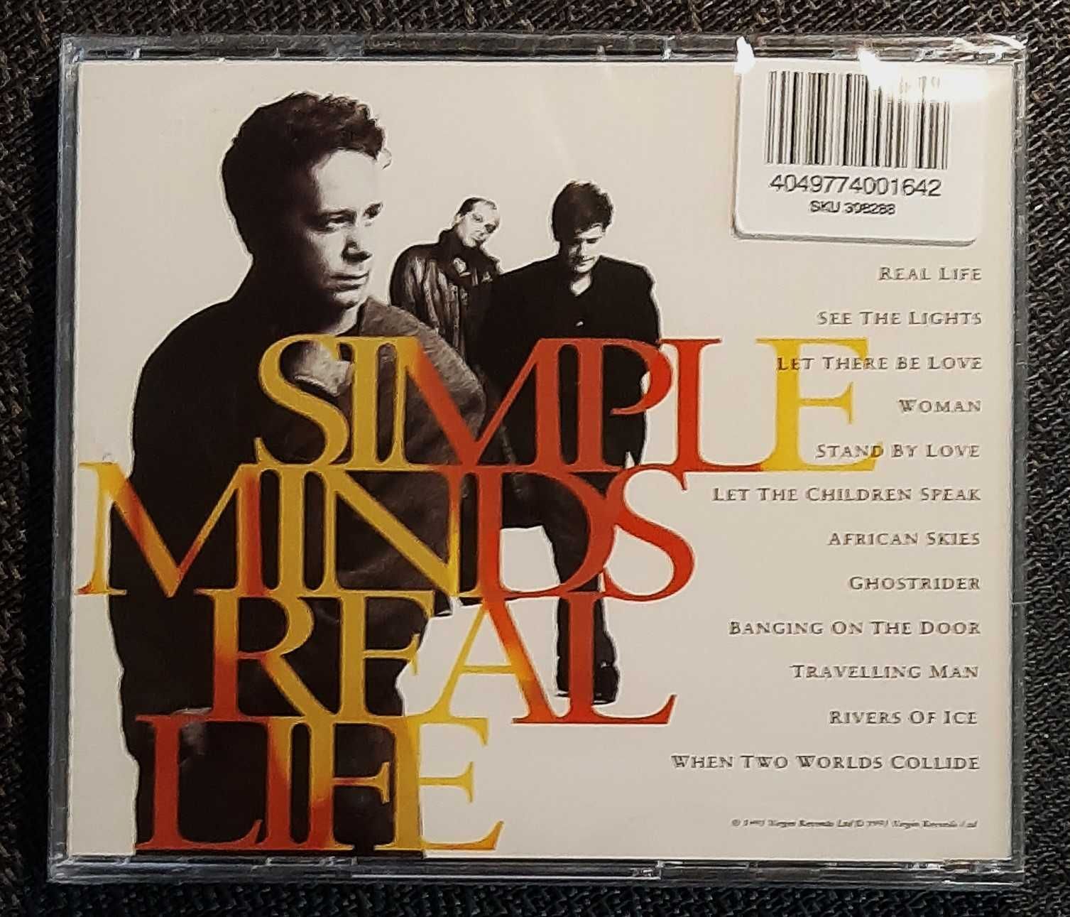 Znakomity Album Cd  SIMPLE  MINDS - Album Real Life  !