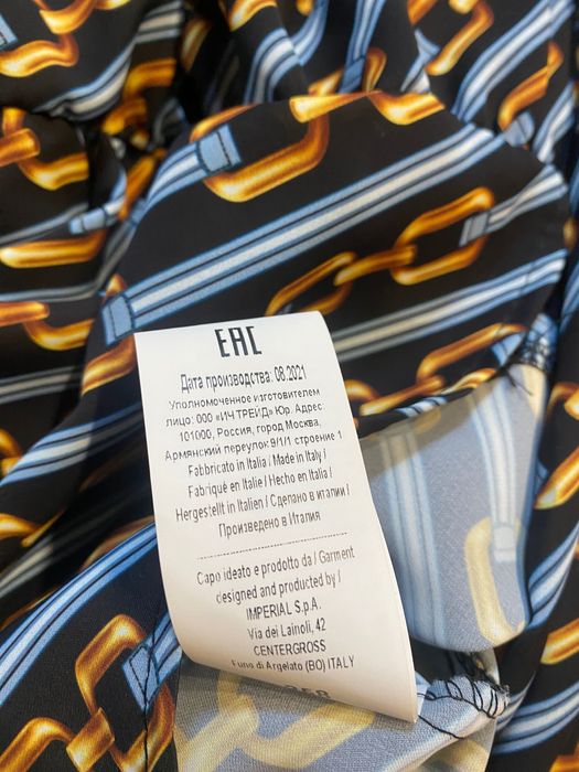 Sukienka Imperial stójka bufiasty długi rękaw glamour awangardowa