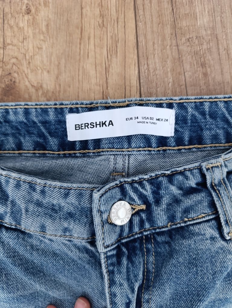 Spodnie jeansowe damskie dżinsy z rozdarciami Bershka 34 szerokie