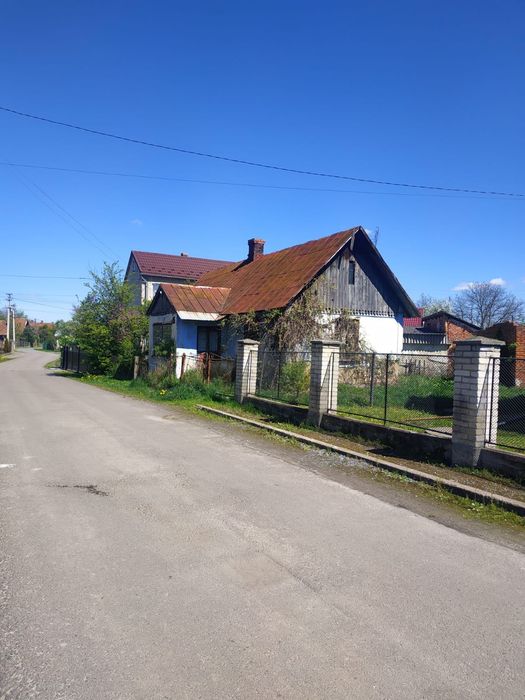 Продається земельна ділянка з будинком