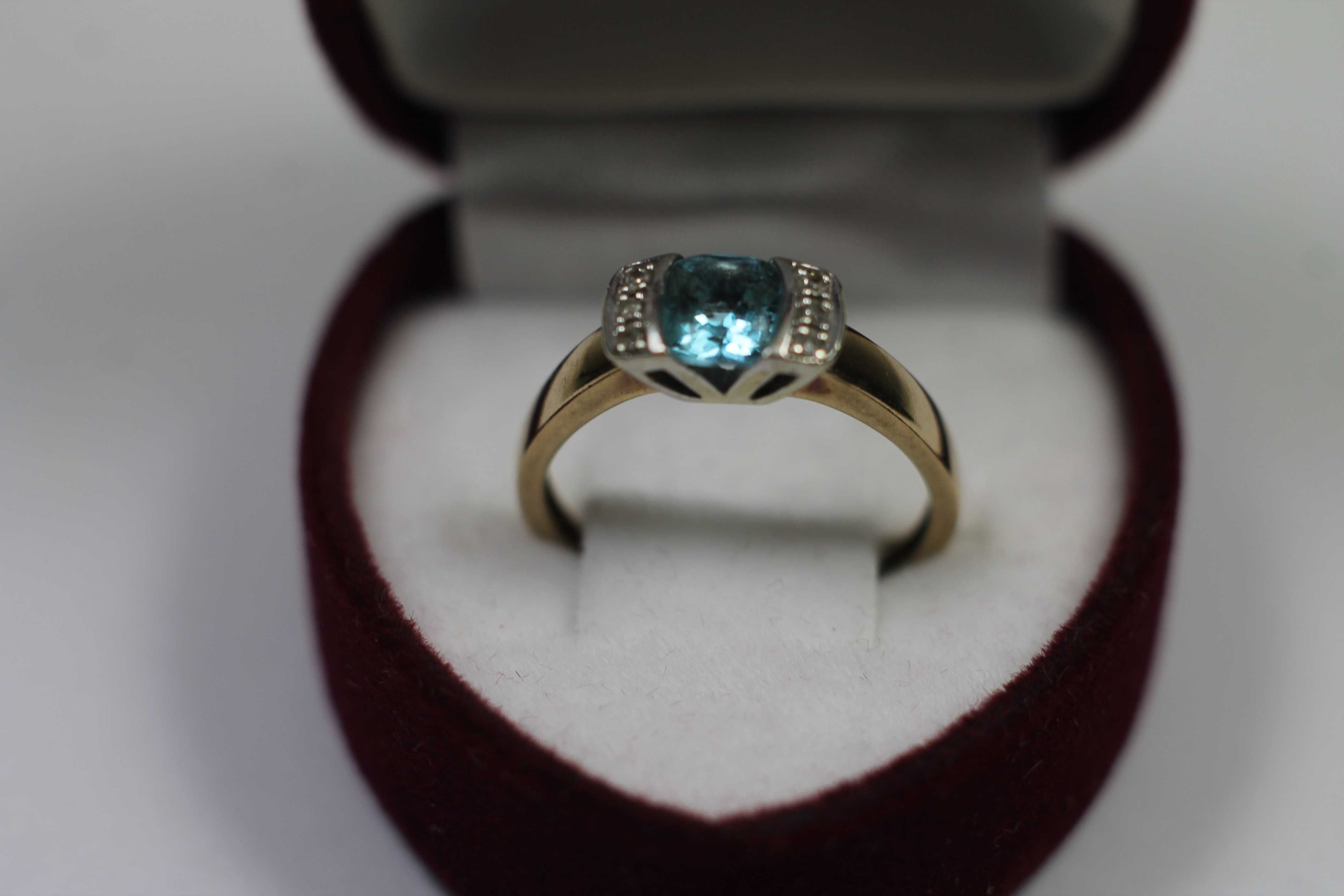 Złoty pierścionek p333 1,91g R11 topaz diamenty