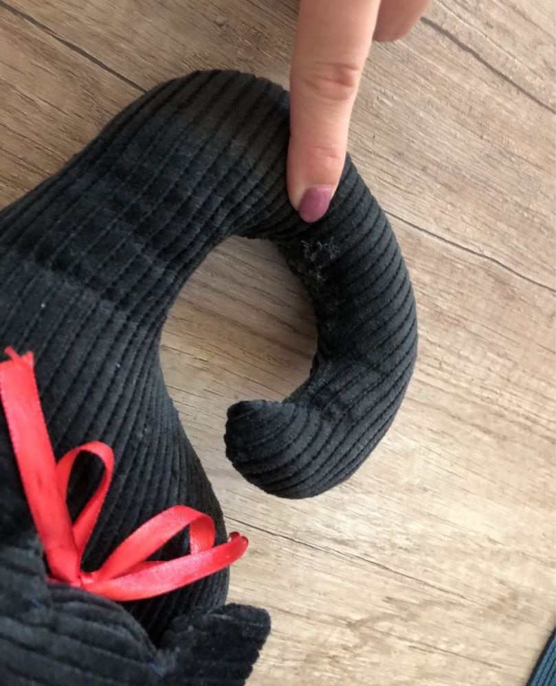 Kot odbijak odbojnik na klamkę drzwi