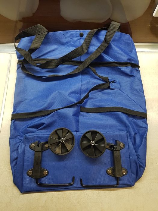 Шопер трансформер на колесиках синій з дефектом одного колеса фото є!