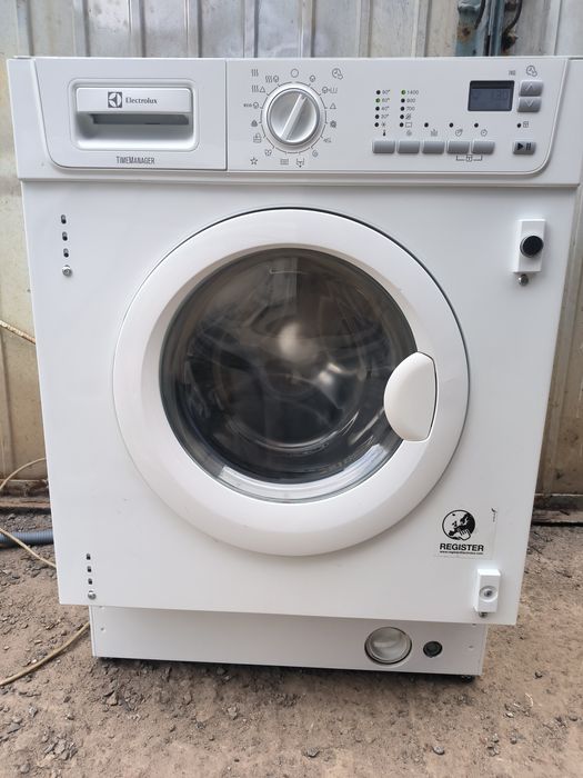 Встраиваемая стирально-сушильная Electrolux 7 кг, 1400 об/мин в отличн