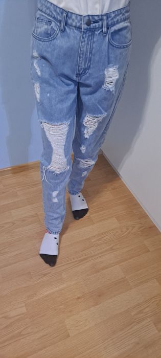 Spodnie jeansowe z dziurami Missguided r s