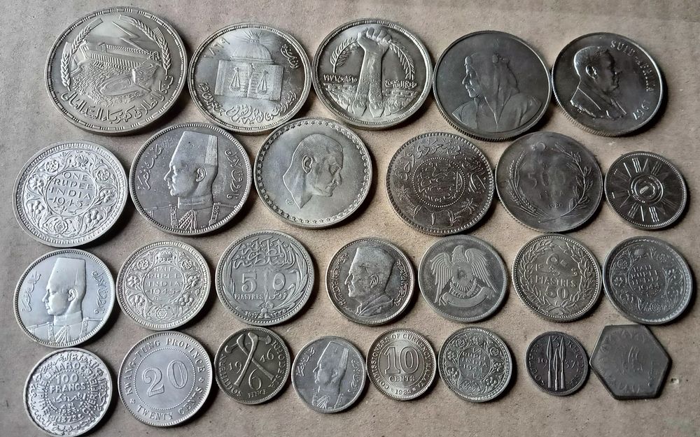 Срібні монети на продаж Азія та Африка